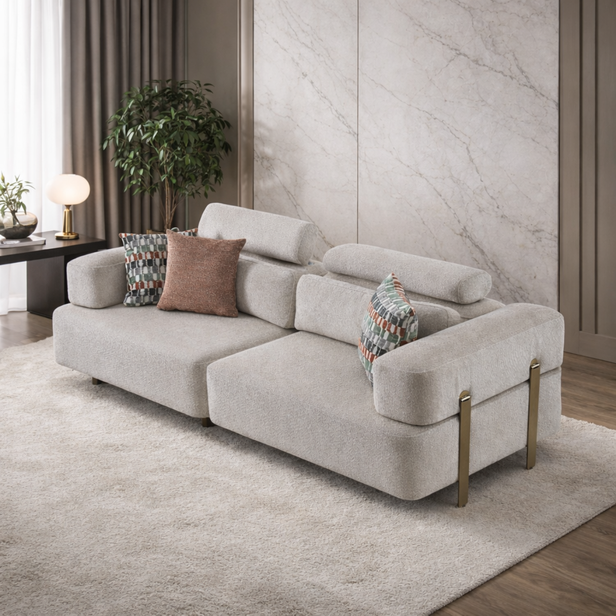 Gray sectional sofa with decorative pillows in a modern living room setting.