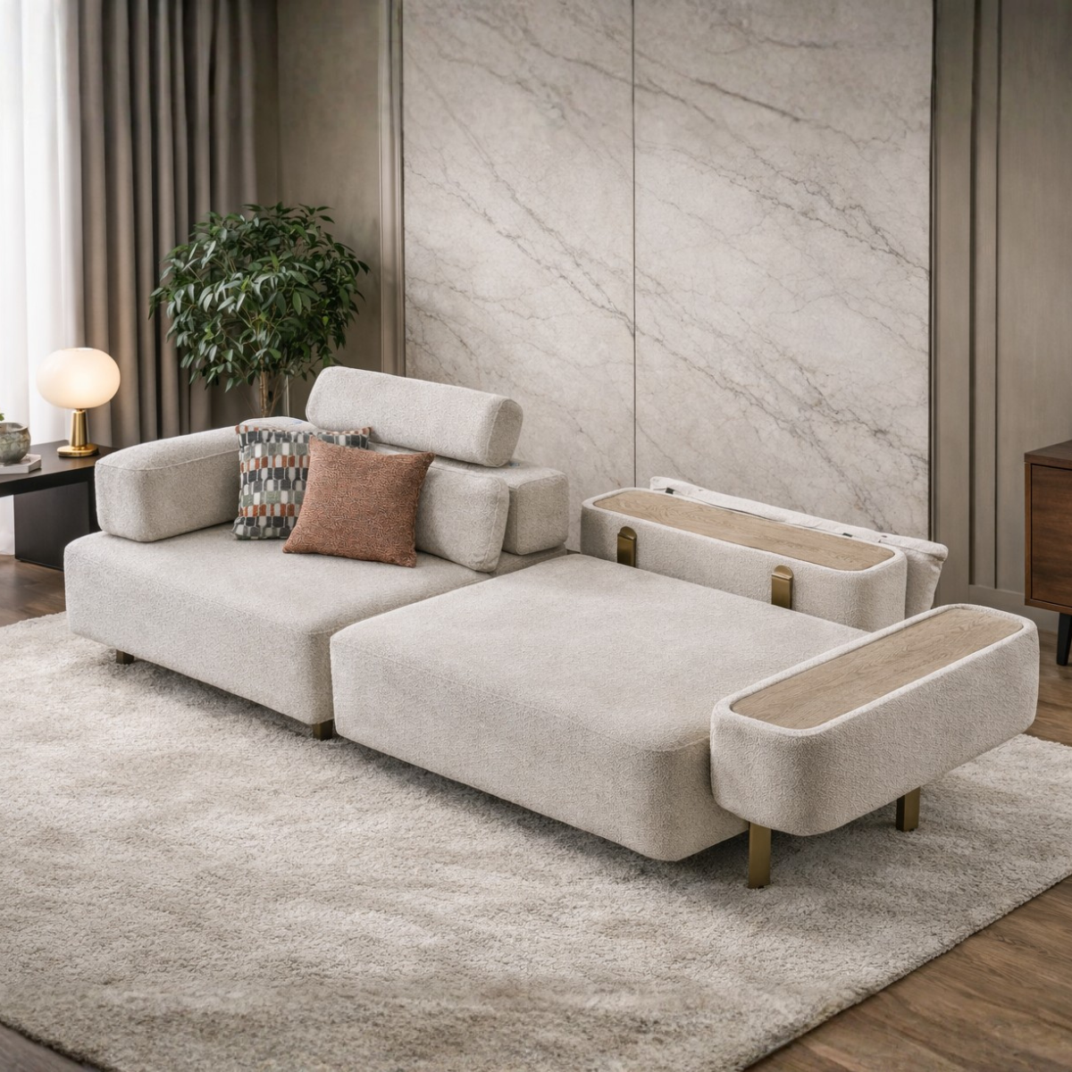 Modern beige sectional sofa in a living room setting with marble wall and rug.